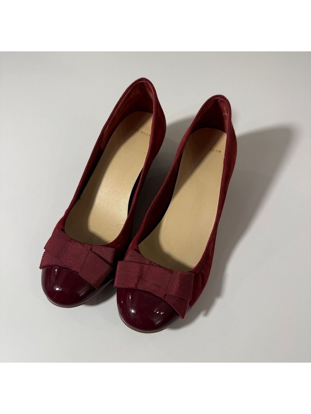 Cole Haan Burgundy Suede Wedge Heels with Bow Accent and Patent Toe Cap